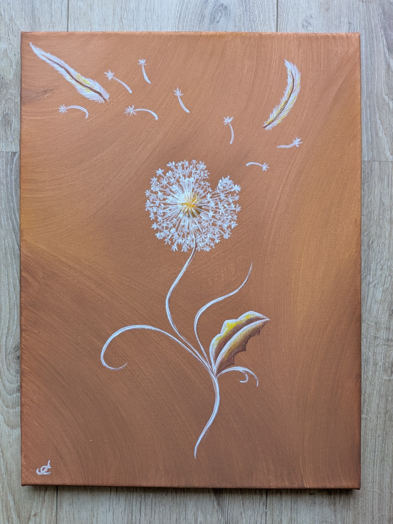 La légèreté d'un pissenlit sur un fond aux couleurs de l'automne.